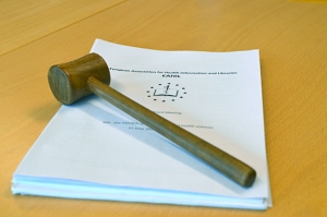 Gavel and papers.